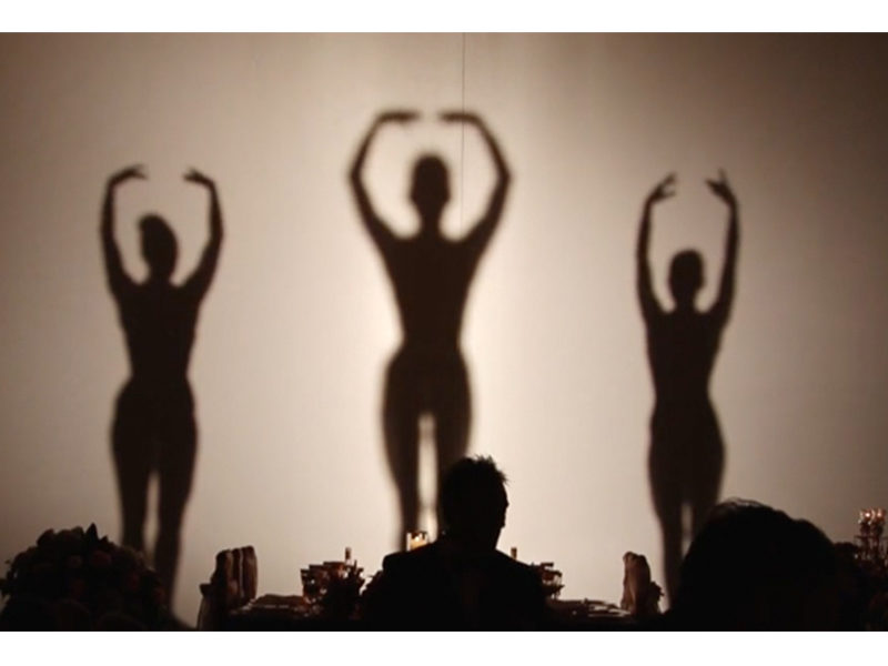 Shadow Dancers behind curtain performing in Toronto.